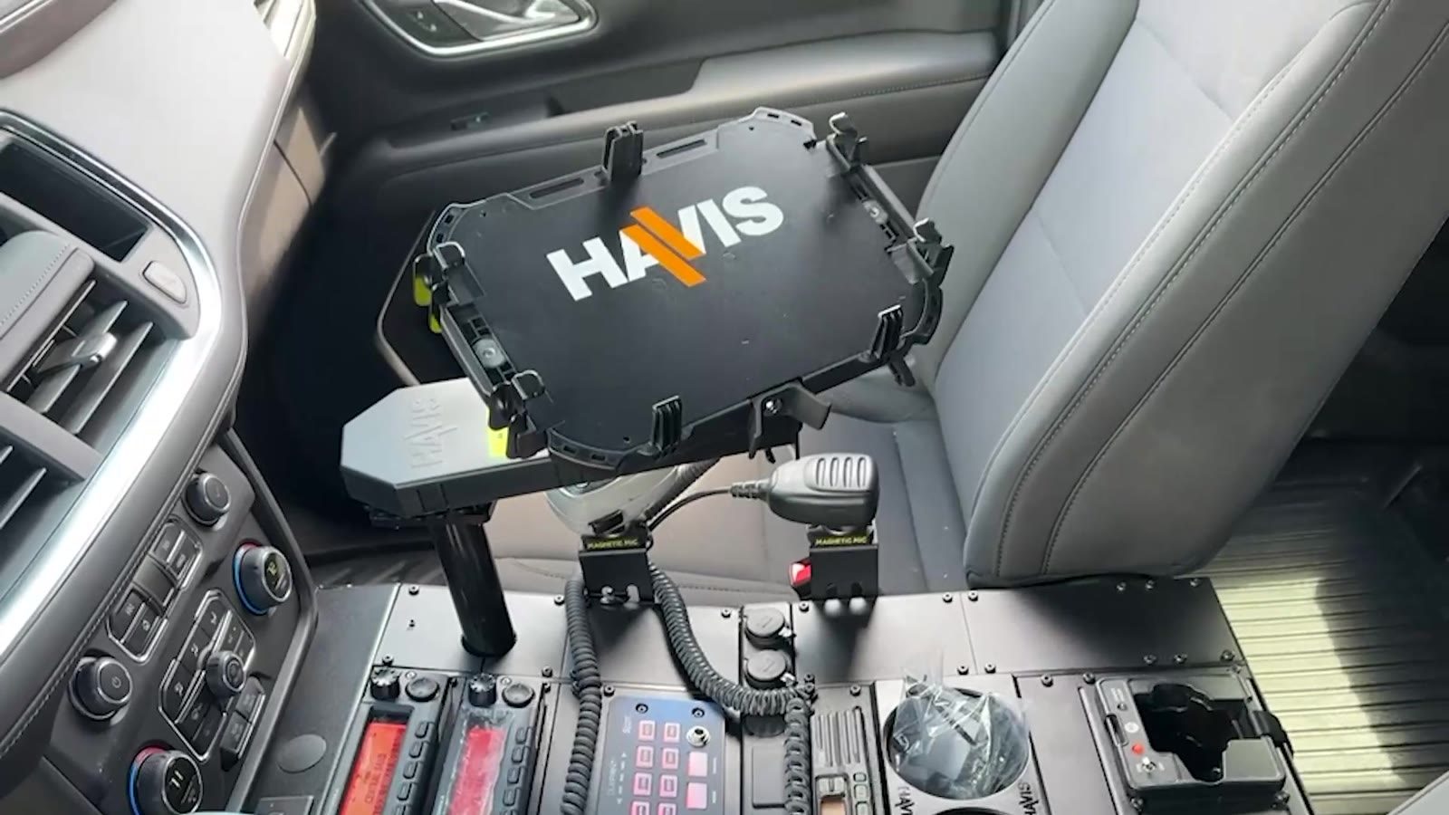 Havis console with laptop mount, radios and Magnetic Mic holders