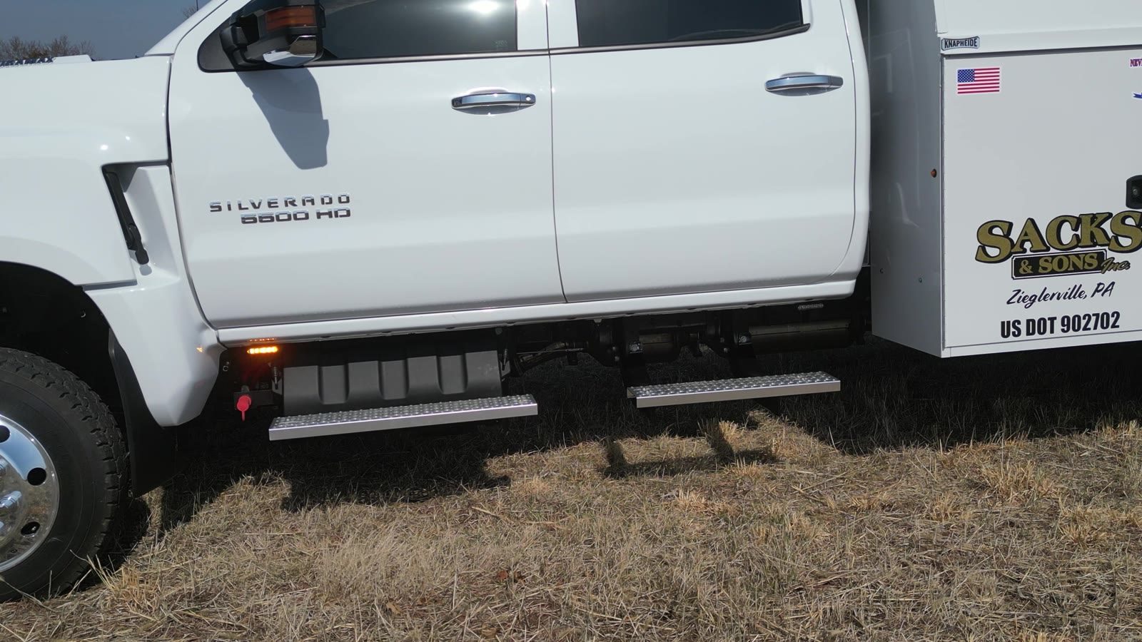 Cab side and step detail with the amber surface mount below the door