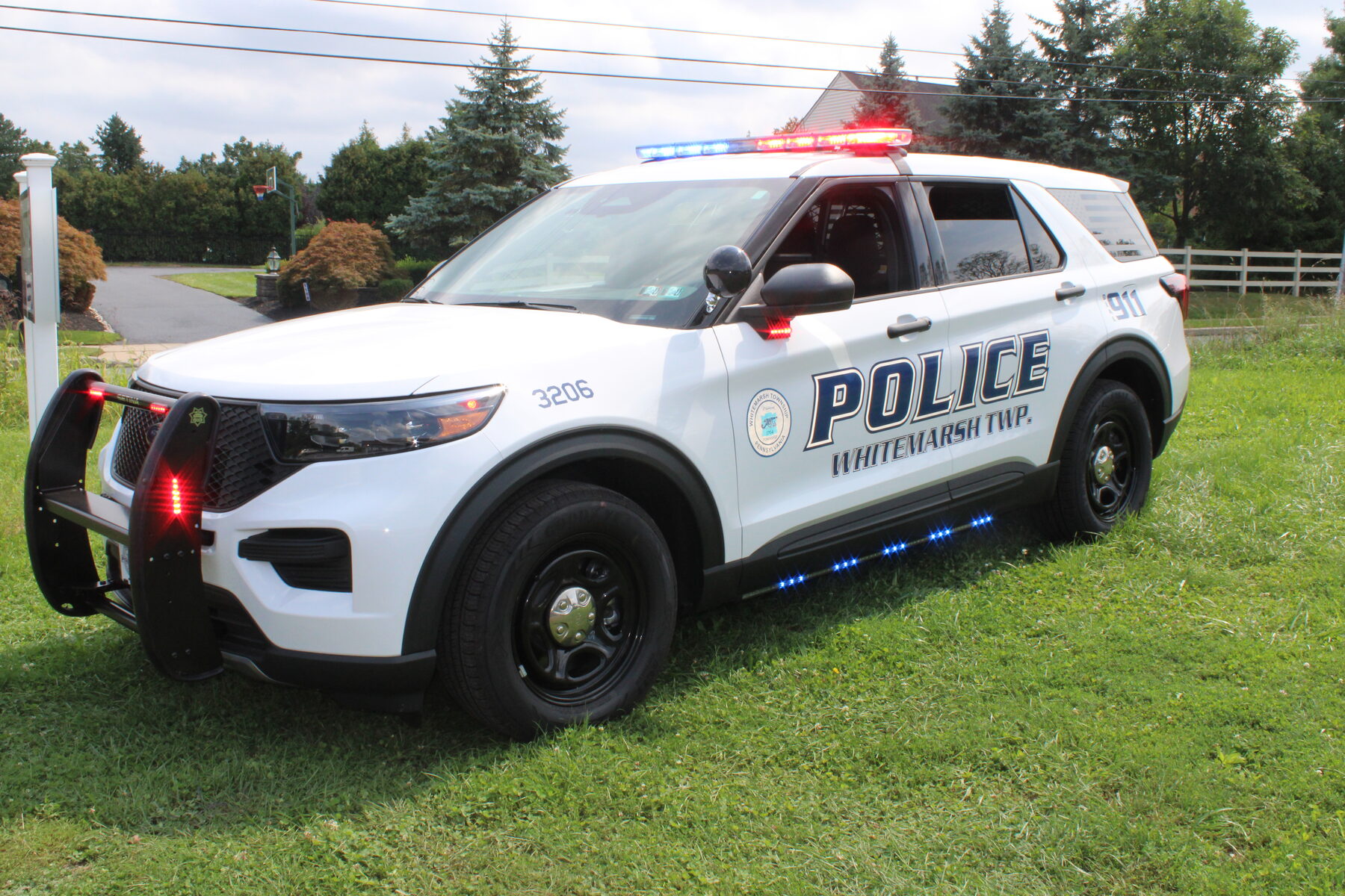 Front three-quarter with lights active