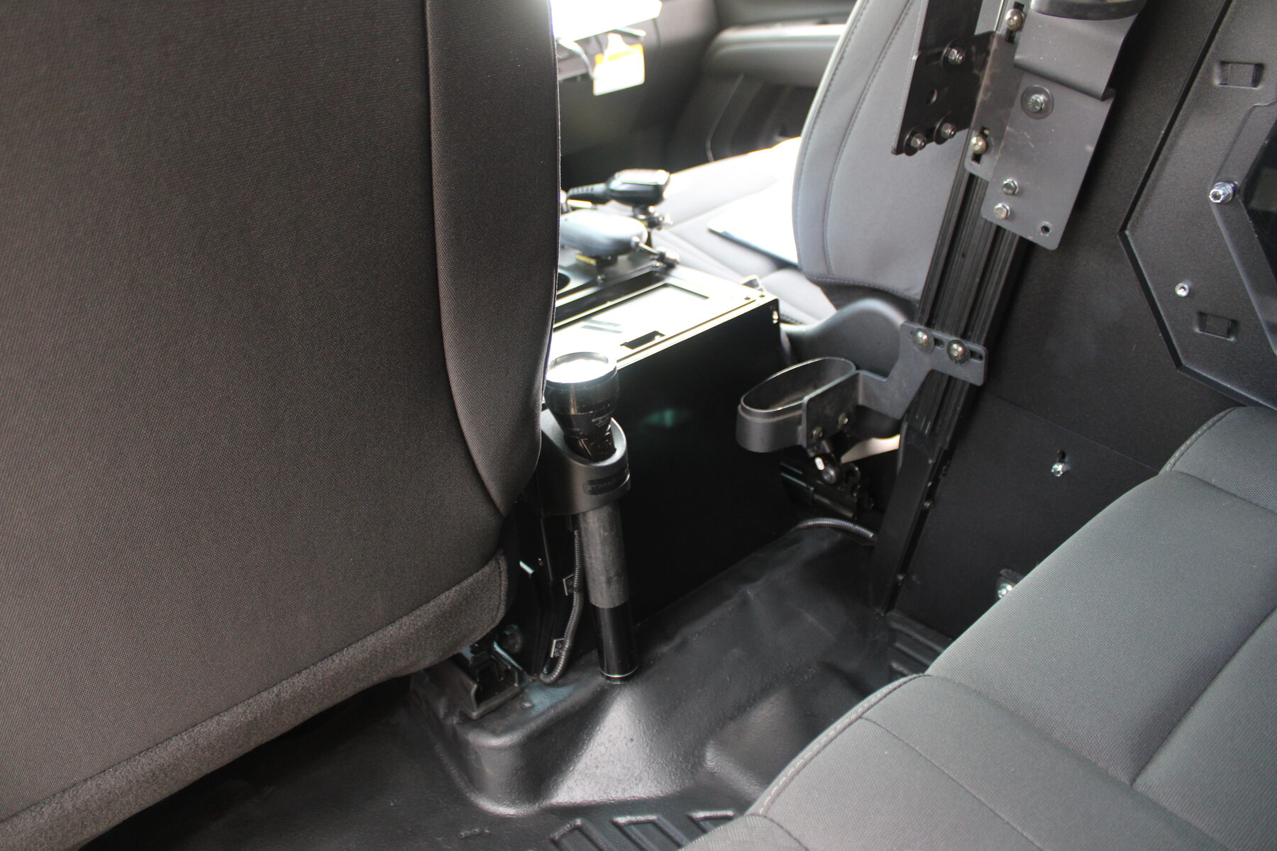 Console rear with flashlight and cup holder