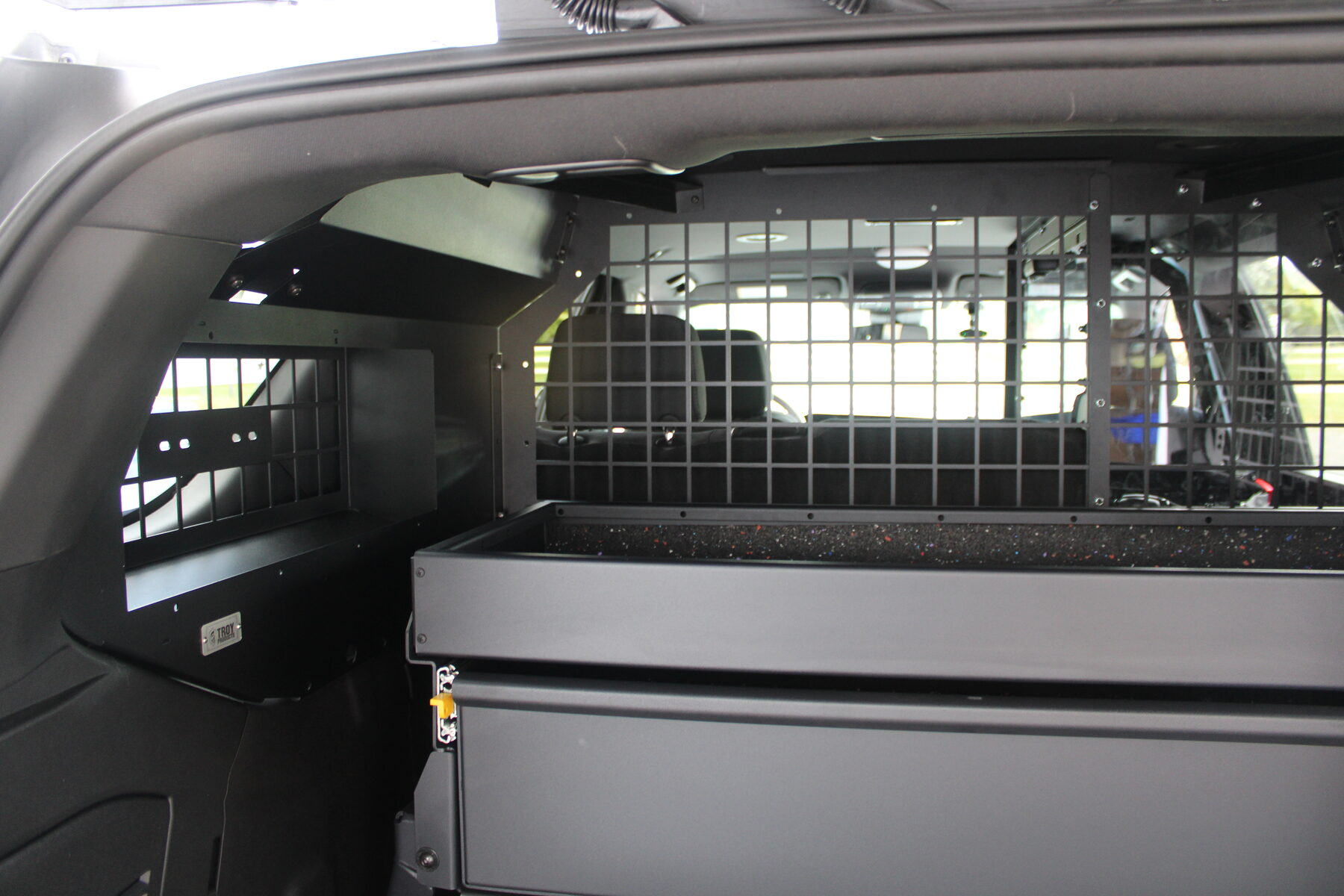Cargo area partition and drawer